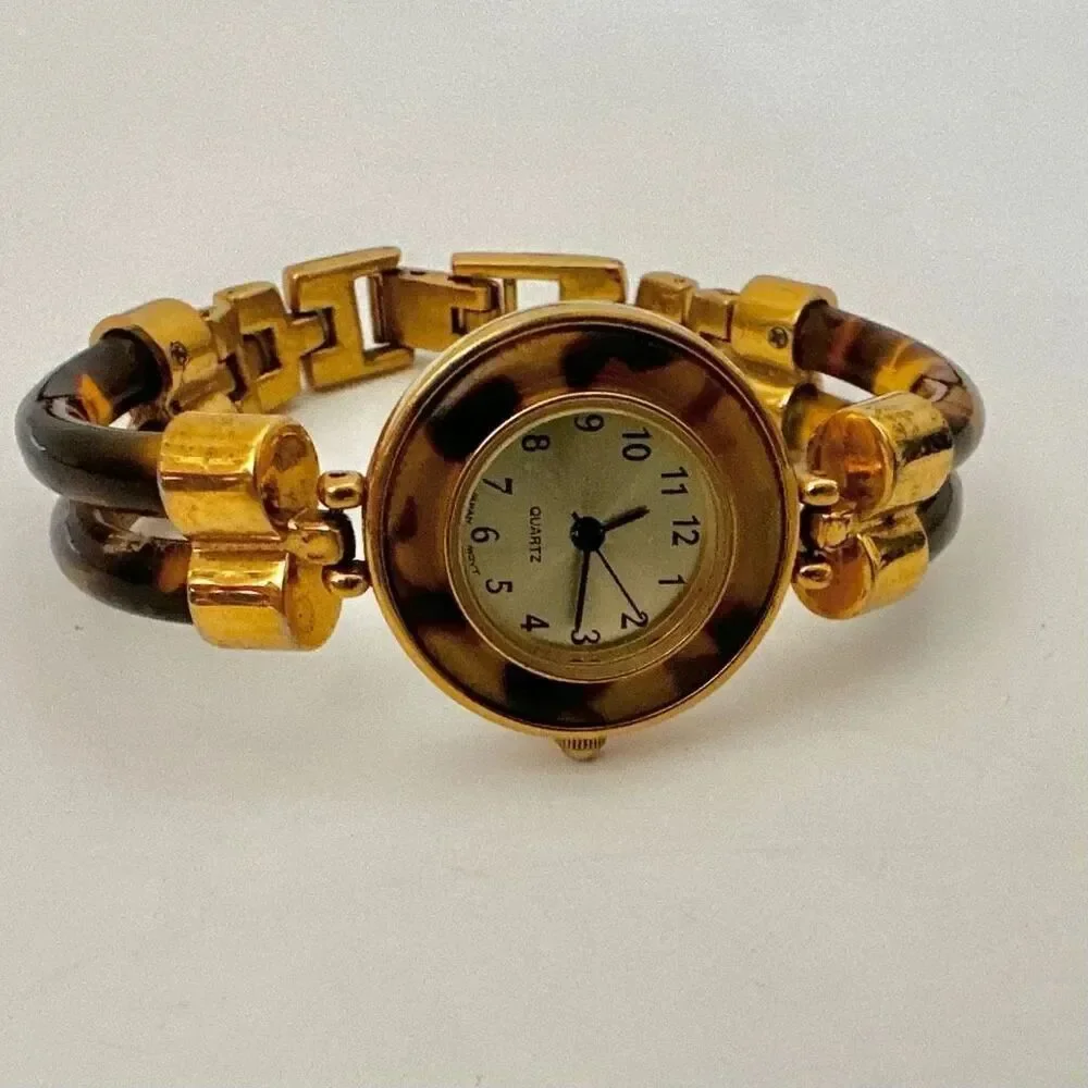 Avon faux tortoise vintage watch/ bracelet.